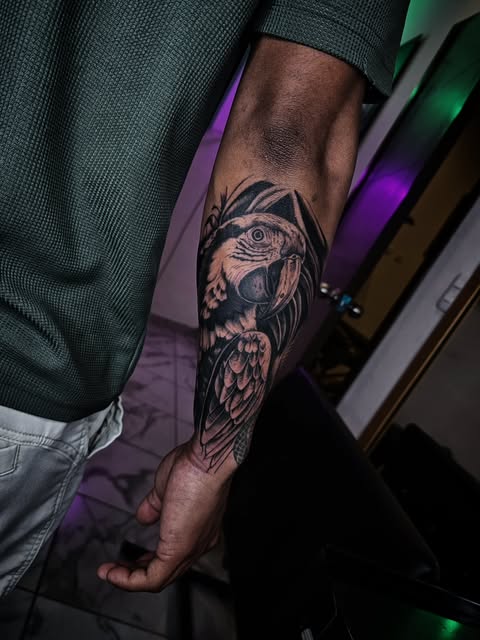 Tattoo by Nury: Parrot in black ink